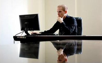 Tax professional preparing a return at his desk